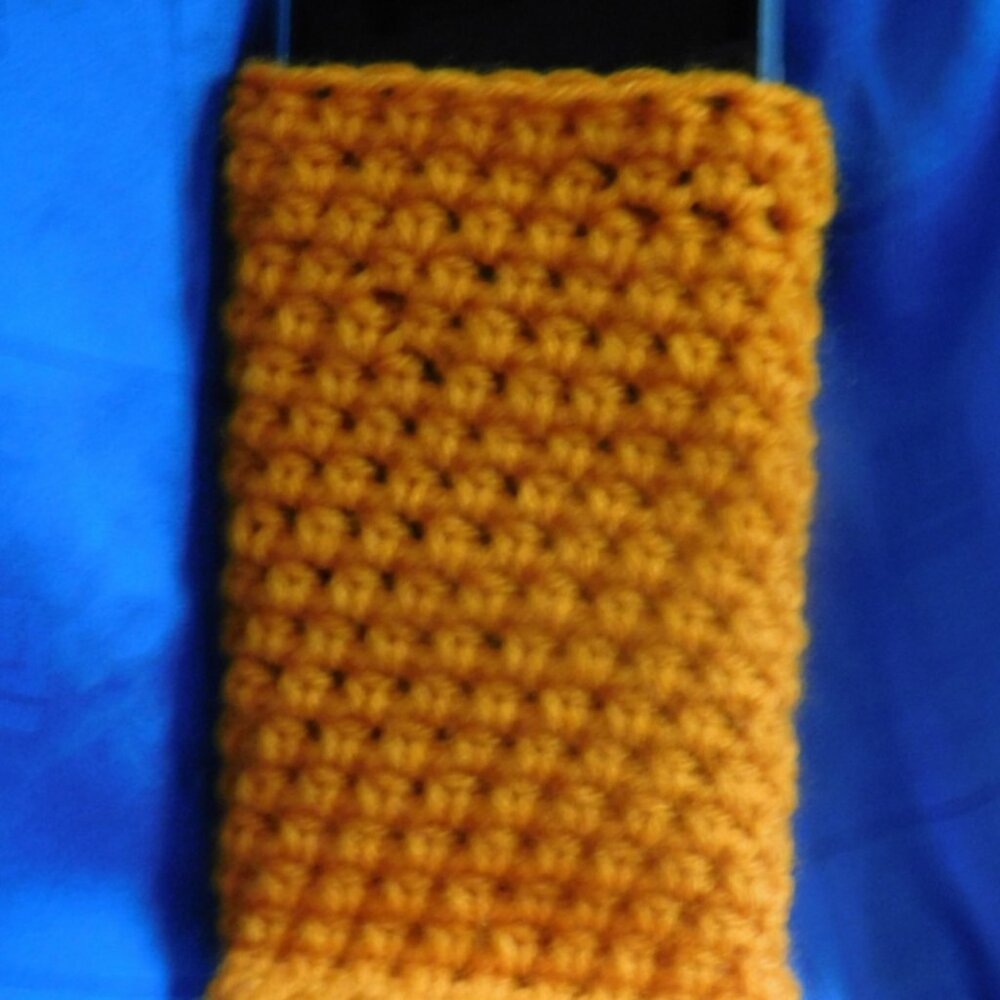 Orange crocheted cellphone case 4x7 inches